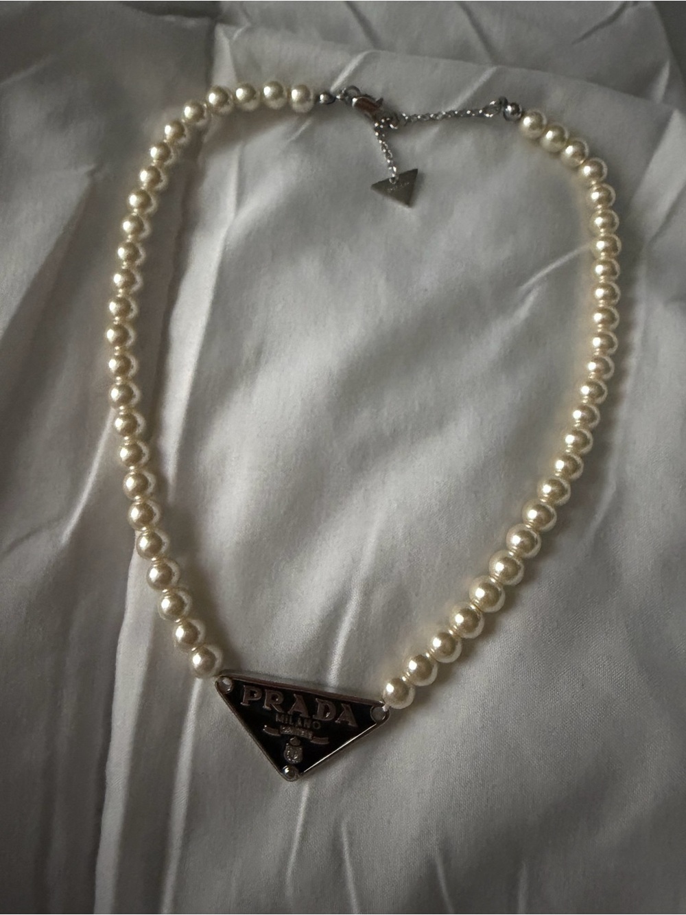 Prada Cream Pearl Necklace with Silver Triangle Logo